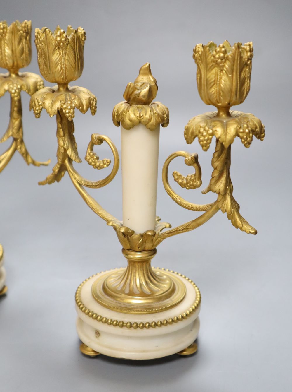 A pair of 19th century ormolu and alabaster candelabra, height 19cm